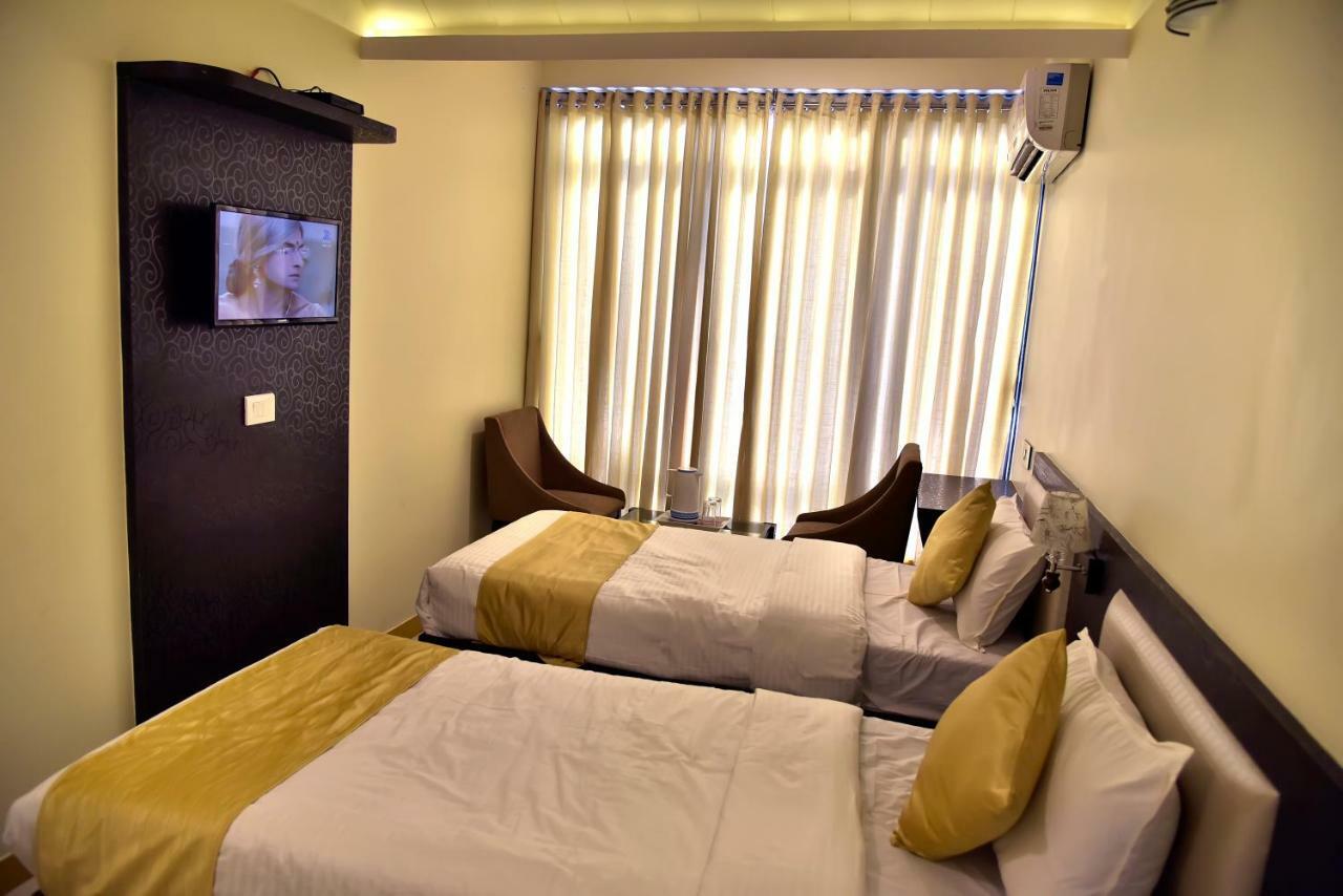 Fabexpress Time Square Hotel Тане Екстериор снимка